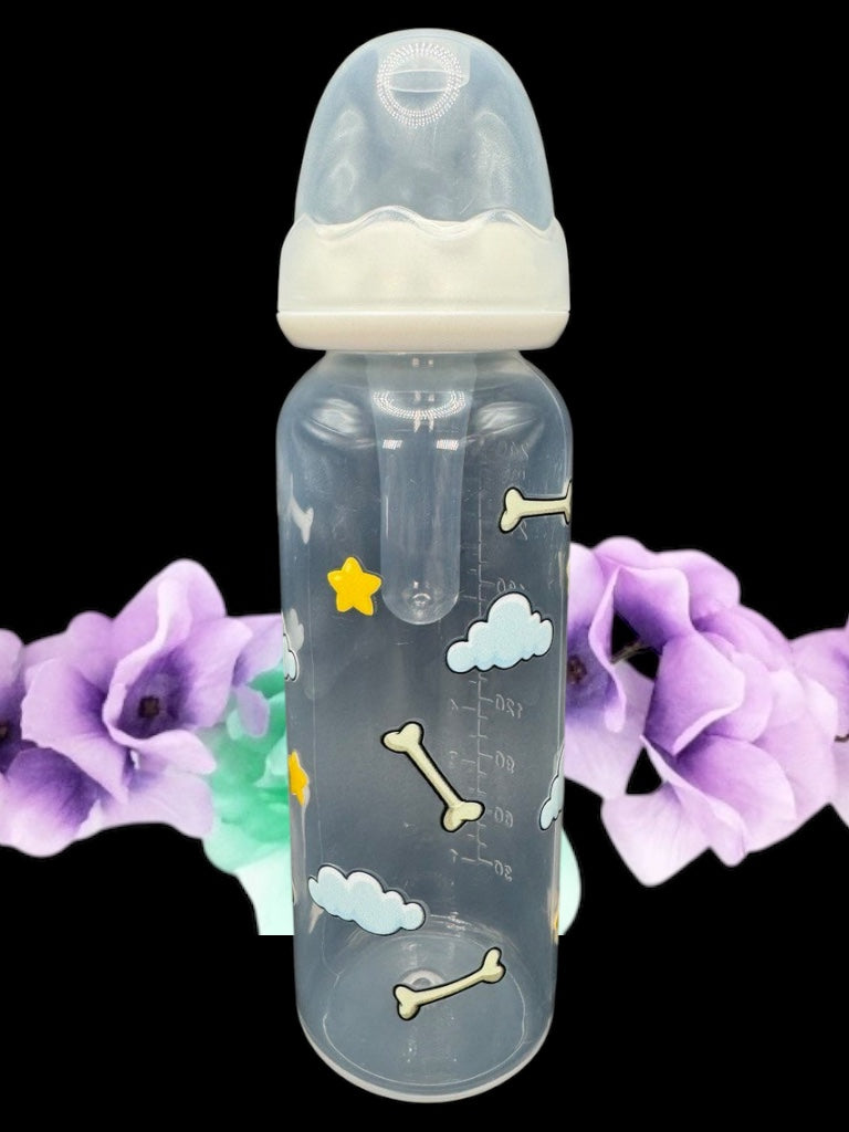 Nighttime dog-themed adult baby bottle featuring a wrap-around design of dog bones, fluffy clouds, and twinkling stars, creating a cozy and comforting aesthetic.