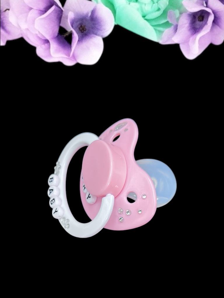 Cry Baby adult deco pacifier featuring a decorative diamond gem design on the shield and handle, adding a stylish and playful touch.