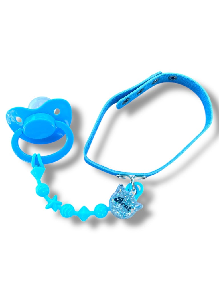 ABDL adult pacifier choker with baby blue strap and glitter "Brat" tag