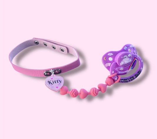 Custom adult pacifier choker featuring a leather choker, an attached adult pacifier, and a customizable resin dog tag for a personalized touch.