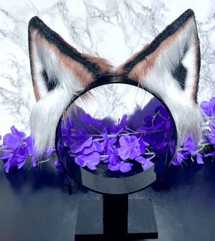 Fox cosplay ears featuring soft, fluffy fur and a realistic design, perfect for adding a playful and foxy touch to any costume or outfit.