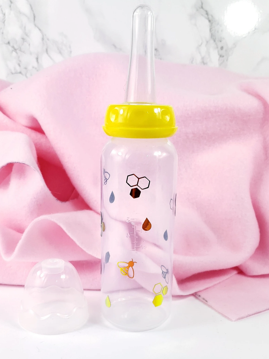 An 8oz ABDL bottle featuring a cheerful bee theme, with cute bees, honeycombs, and vibrant honey gold accents wrapping around the bottle for a playful and whimsical design.