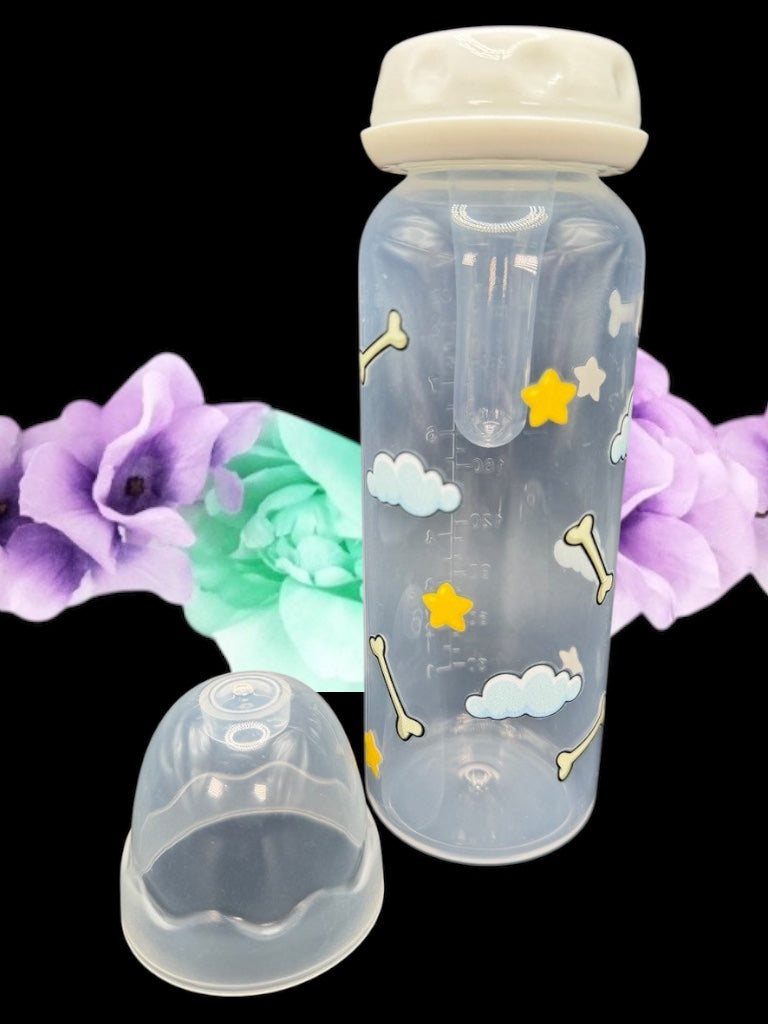 Nighttime dog-themed adult baby bottle featuring a wrap-around design of dog bones, fluffy clouds, and twinkling stars, creating a cozy and comforting aesthetic.