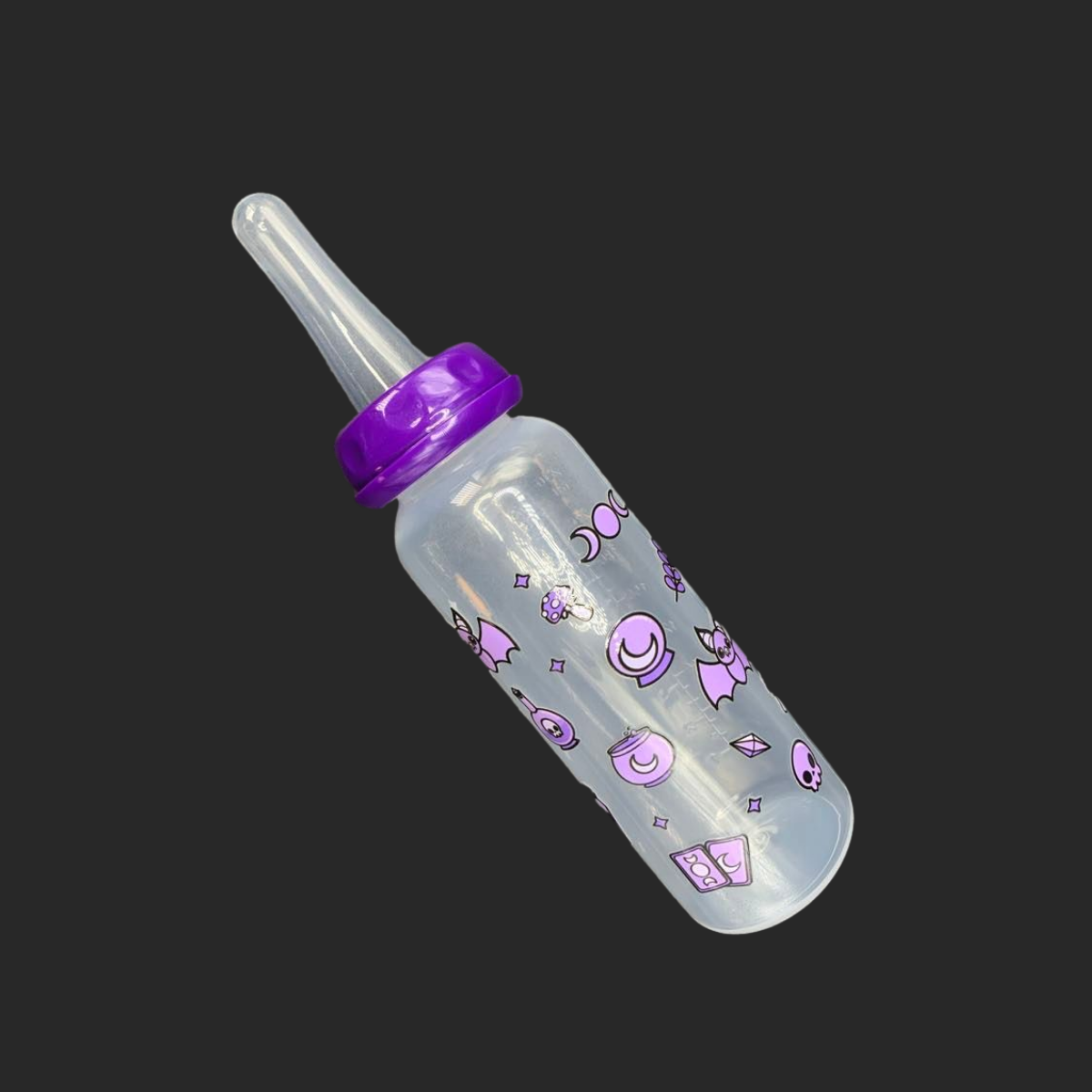 An 8oz adult baby bottle with a purple witch theme, featuring magical designs like bats, tarot cards, potions, stars, and moons wrapping around the bottle for a whimsical and enchanting look.