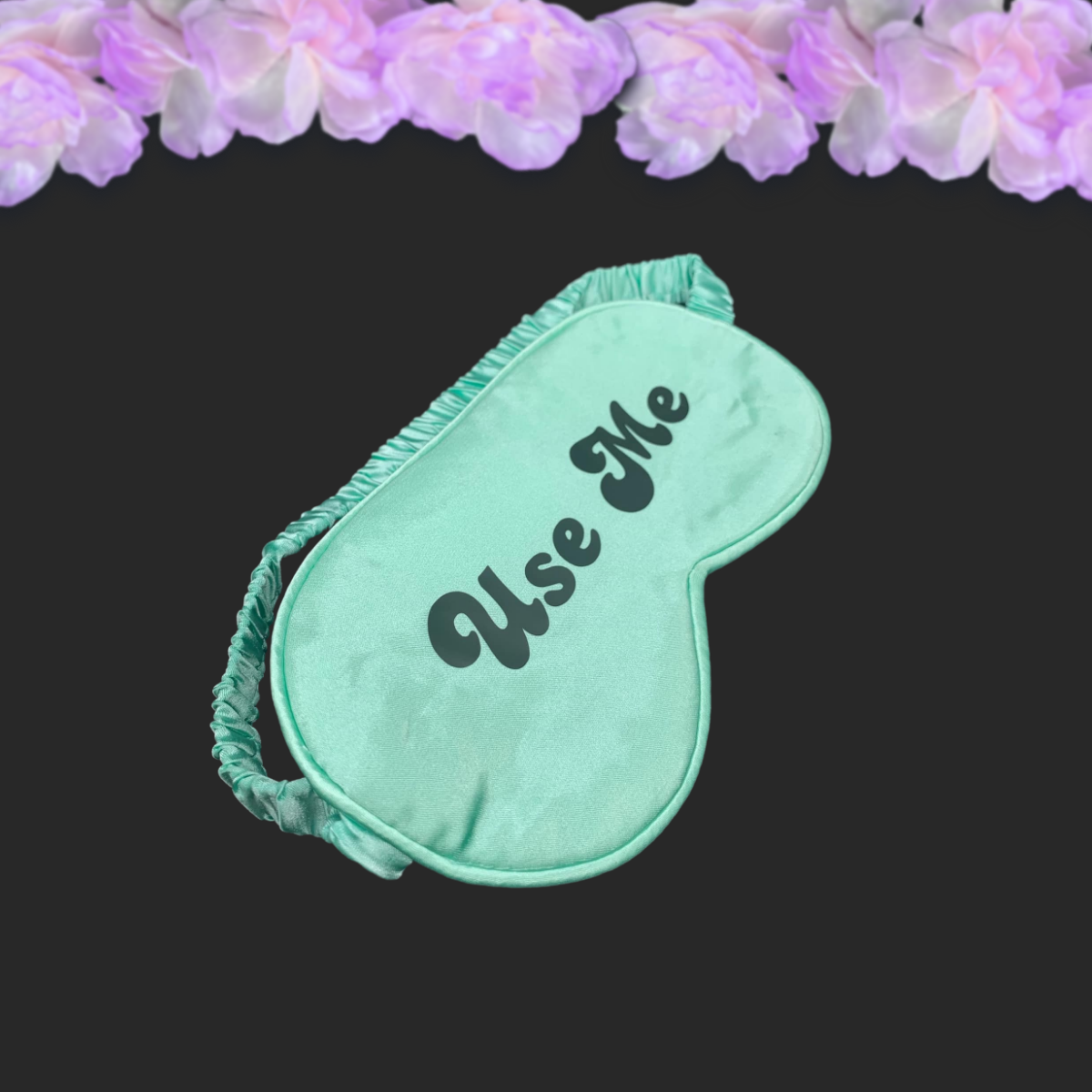 mint satin blindfold with bubbly black text saying use me