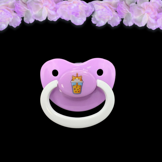 Cute purple adult pacifier with a cat and bubble tea design, perfect for little space and ABDL enthusiasts.