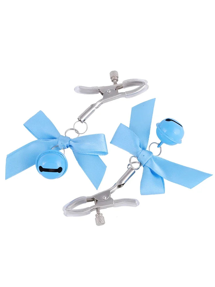 Stainless steel nipple clamps with baby blue attached bows and bells at the ends, featuring a silicone cover for added comfort and a stylish, playful touch.