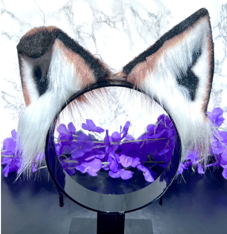 Fox cosplay ears featuring soft, fluffy fur and a realistic design, perfect for adding a playful and foxy touch to any costume or outfit."