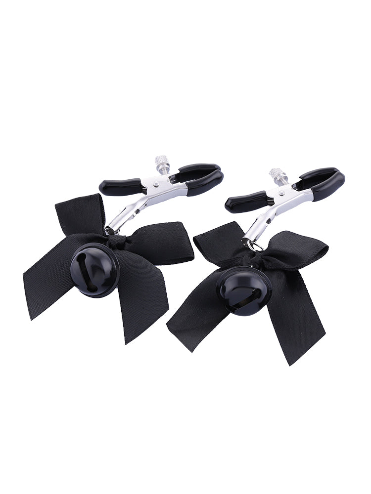 Stainless steel nipple clamps with black attached bows and bells at the ends, featuring a silicone cover for added comfort and a stylish, playful touch.