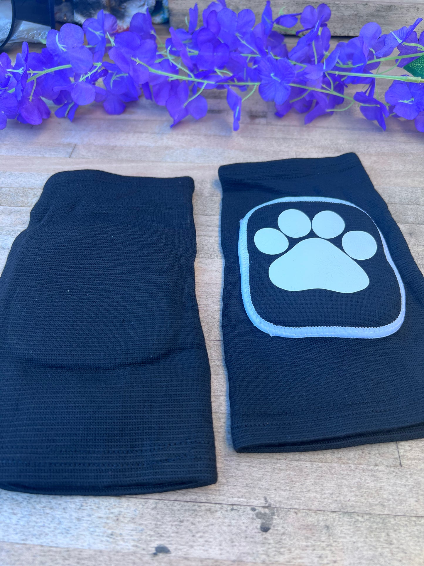 Adult knee pads featuring a cozy design with a paw print on each knee, perfect for pet play or adding a cute animal-themed touch.
