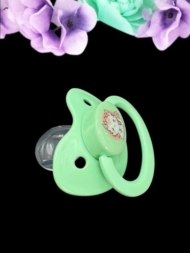 Adult pacifier featuring a Japanese-style dragon in white and red on the center button, combining traditional art with a bold and mystical design.