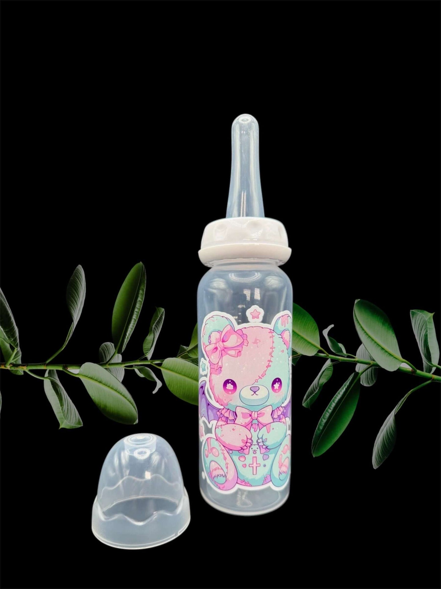 Kawaii adult baby bottle featuring a pastel-colored bear with bat wings, combining a cute and whimsical aesthetic with a touch of punk.