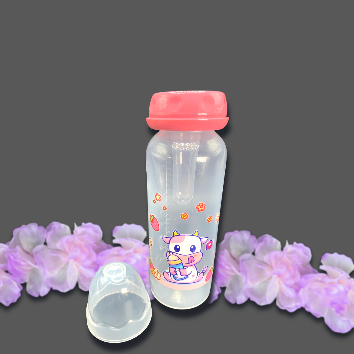 An 8oz adult baby bottle featuring a cute strawberry cow theme, with a playful pink cow, flowers, and strawberries wrapped around the bottle, creating an adorable and sweet design.