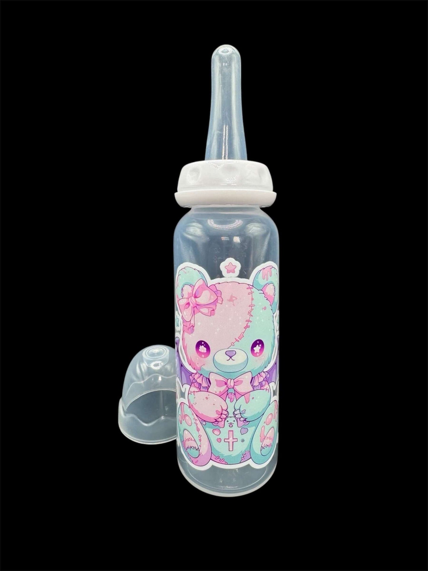 Kawaii adult baby bottle featuring a pastel-colored bear with bat wings, combining a cute and whimsical aesthetic with a touch of fantasy.