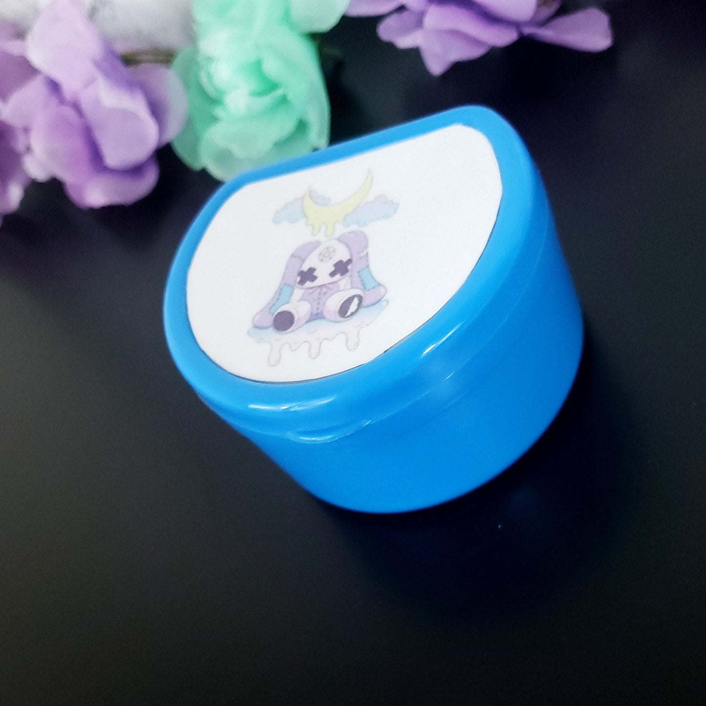 Dark Blue ABDL pacifier case featuring a creepy kawaii purple bunny with dripping moon and pastel clouds