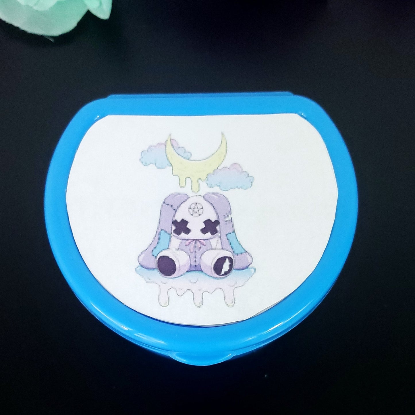 Dark Blue ABDL pacifier case featuring a creepy kawaii purple bunny with dripping moon and pastel clouds