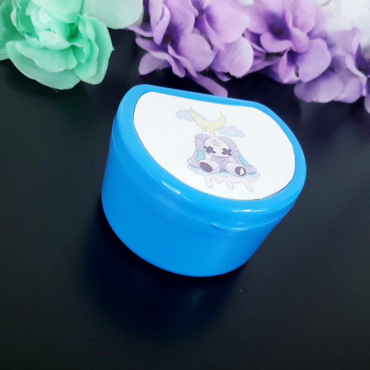 Dark Blue ABDL pacifier case featuring a creepy kawaii purple bunny with dripping moon and pastel clouds