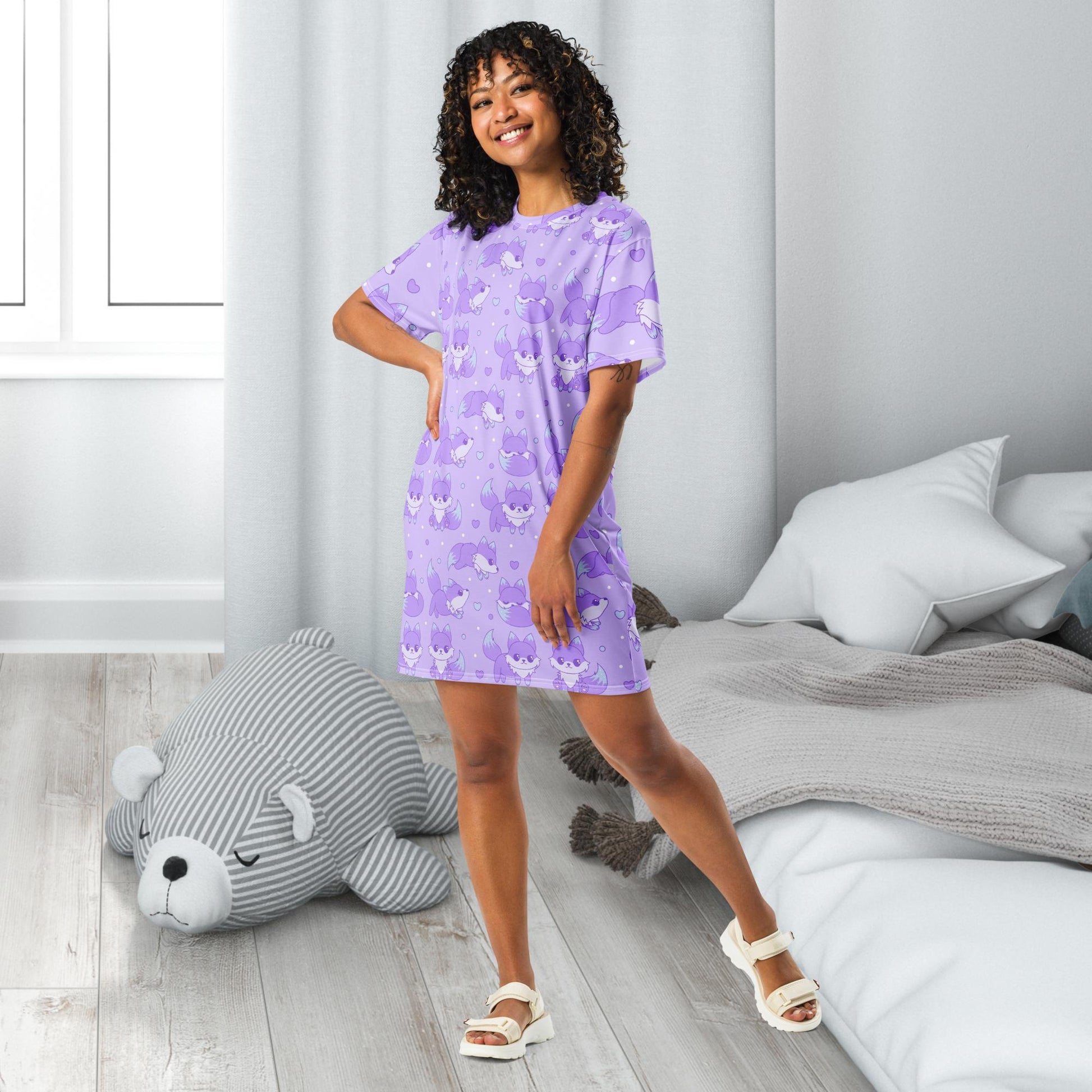 A whimsical adult nightgown featuring a galaxy fox theme, showcasing a vibrant design of a fox surrounded by stars and hearts patterns for a magical and cozy bedtime look.