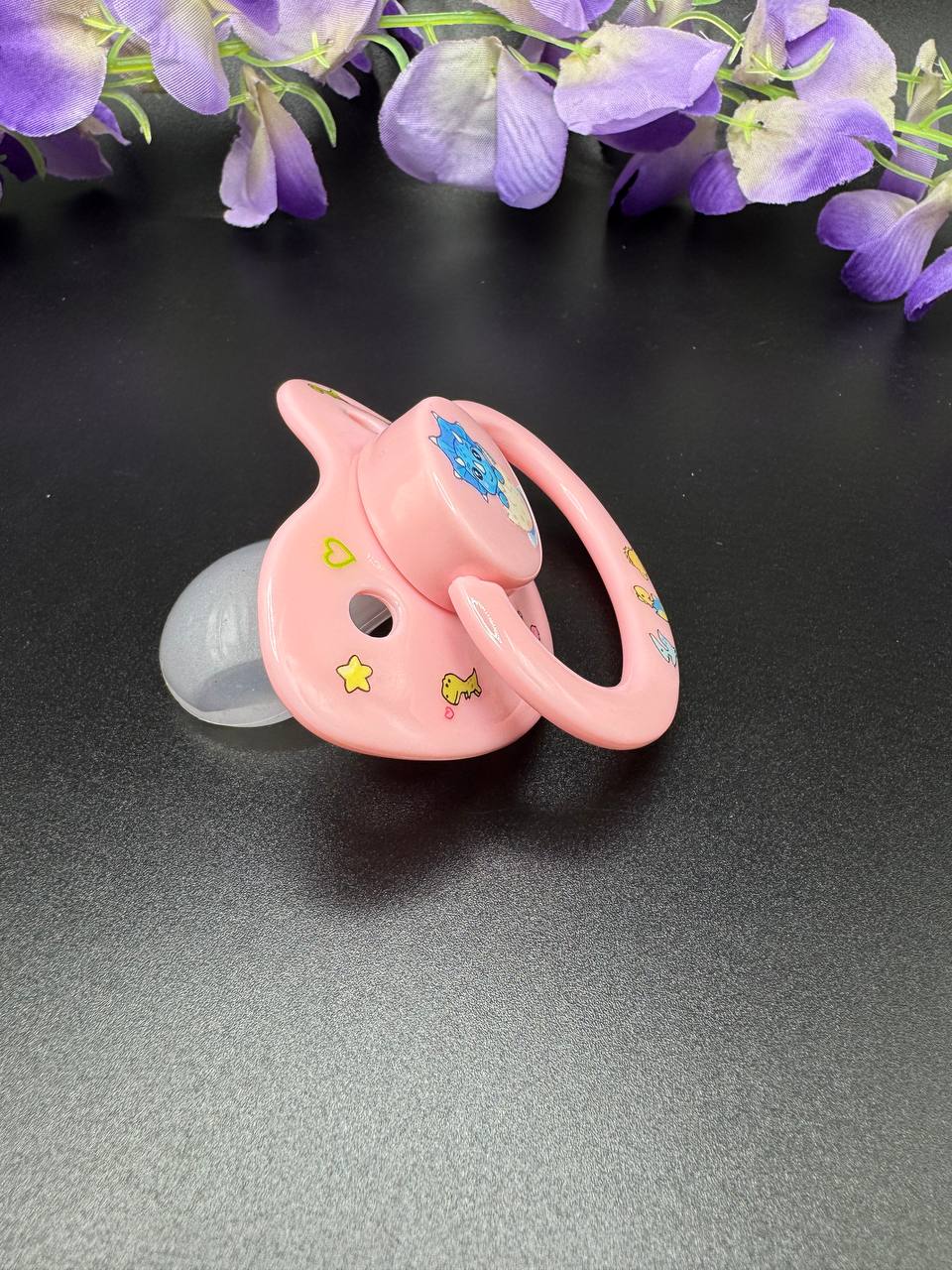 Age regression blue dinosaur adult pacifier with glow in the dark designs