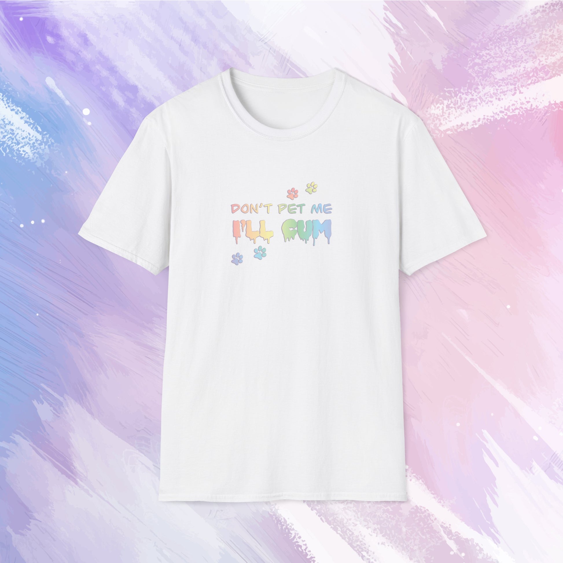 T-shirt featuring text saying "Don't pet me, I'll cum" in rainbow text with cute paw prints going across the text.