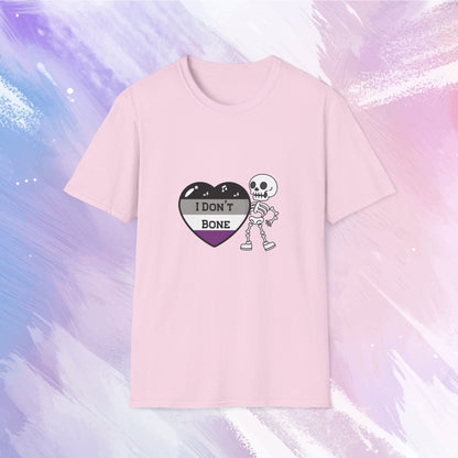 Asexual pride t-shirt featuring a skeleton holding a heart in asexual flag colors—black, gray, white, and purple—with the phrase 'I Don't Bone' in the center, combining pride with a playful spooky theme.