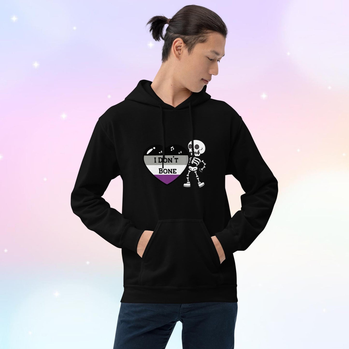 Asexual pride hoodie featuring a heart in asexual flag colors—black, gray, white, and purple—with the phrase 'I Don't Bone' in the center. A skeleton holds the heart, adding a playful yet bold design.