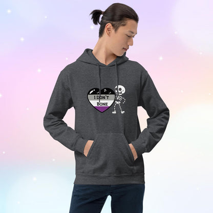 Asexual pride hoodie featuring a heart in asexual flag colors—black, gray, white, and purple—with the phrase 'I Don't Bone' in the center. A skeleton holds the heart, adding a playful yet bold design.