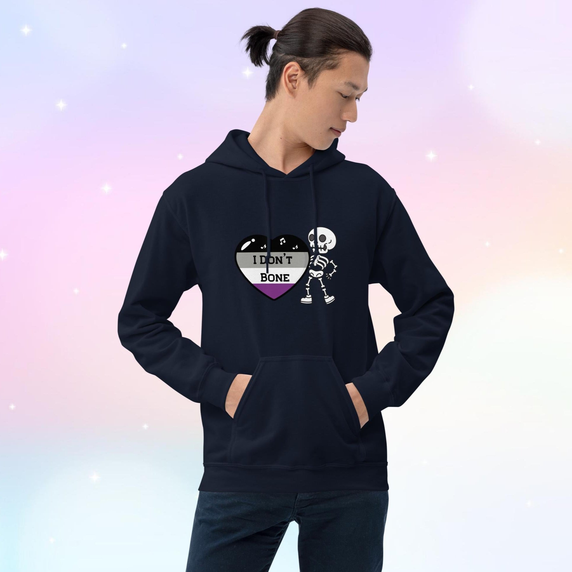 Asexual pride hoodie featuring a heart in asexual flag colors—black, gray, white, and purple—with the phrase 'I Don't Bone' in the center. A skeleton holds the heart, adding a playful yet bold design.