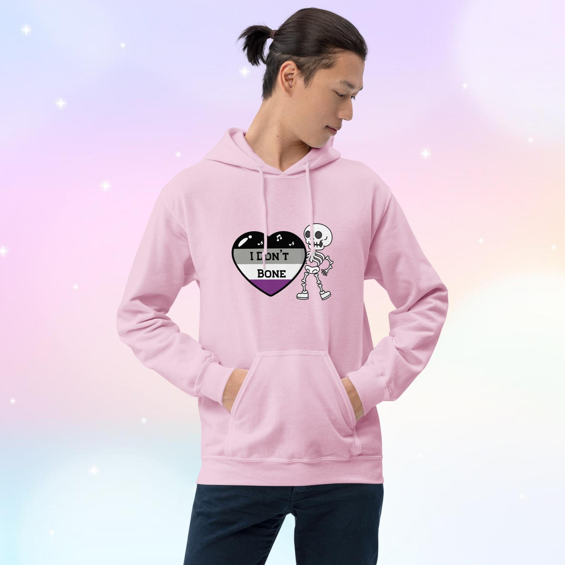 Asexual pride hoodie featuring a heart in asexual flag colors—black, gray, white, and purple—with the phrase 'I Don't Bone' in the center. A skeleton holds the heart, adding a playful yet bold design.