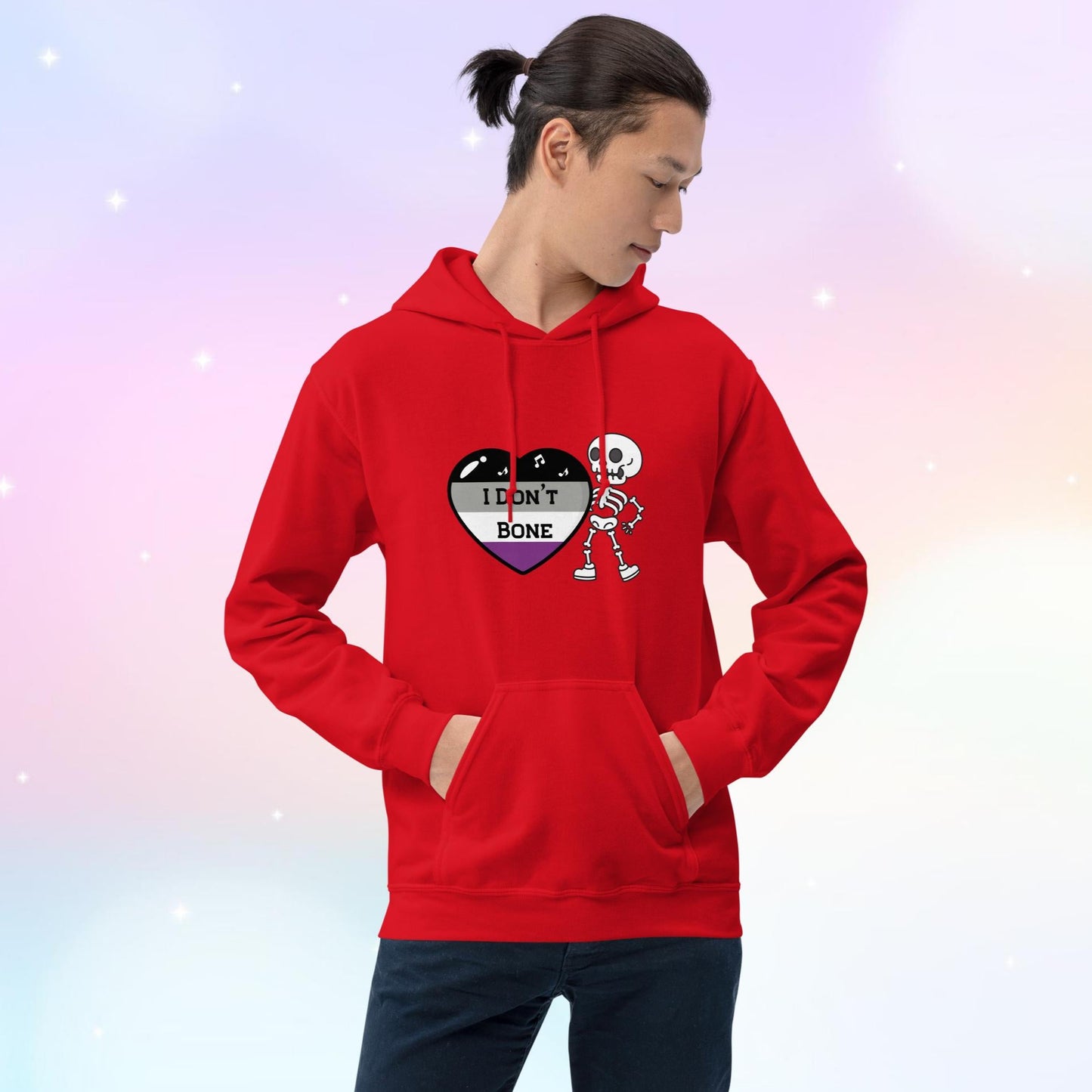 Asexual pride hoodie featuring a heart in asexual flag colors—black, gray, white, and purple—with the phrase 'I Don't Bone' in the center. A skeleton holds the heart, adding a playful yet bold design.