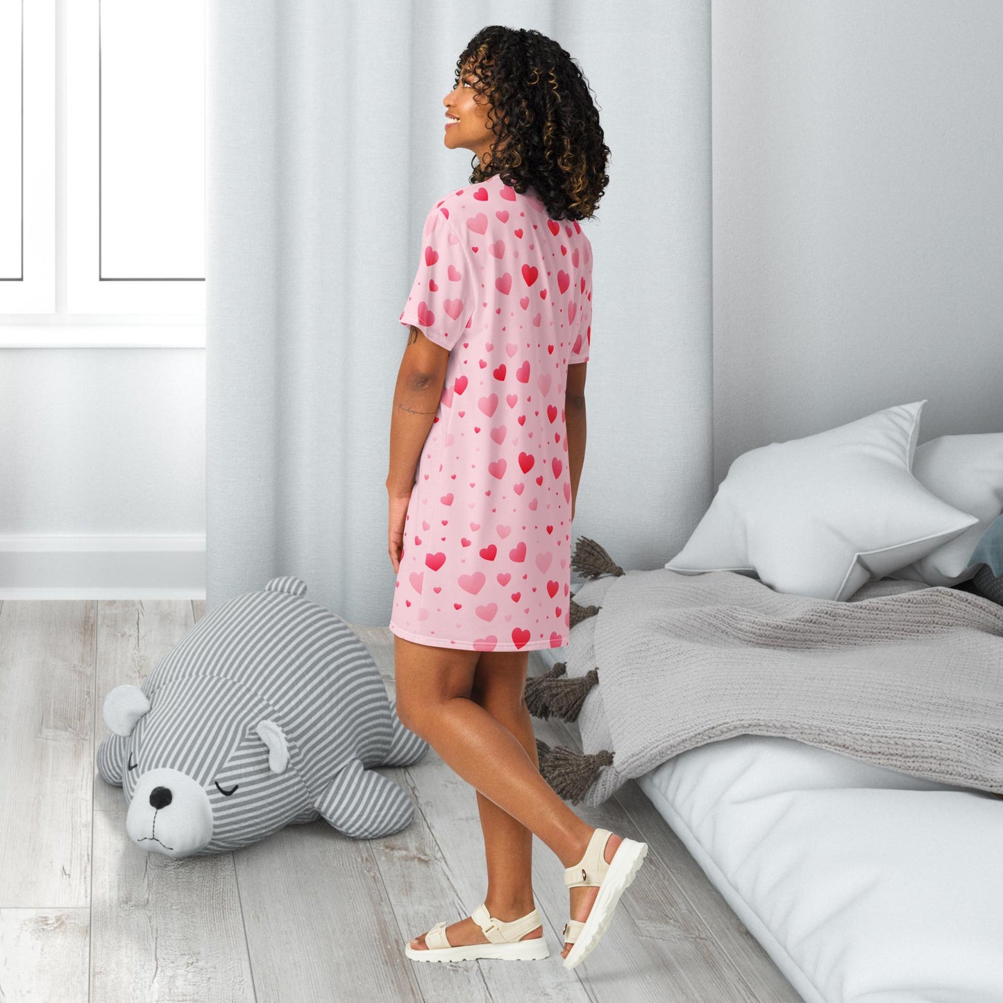 A pink adult nightgown covered in red hearts, featuring the text "Little Girl" in elegant lettering, creating a sweet and playful bedtime look.