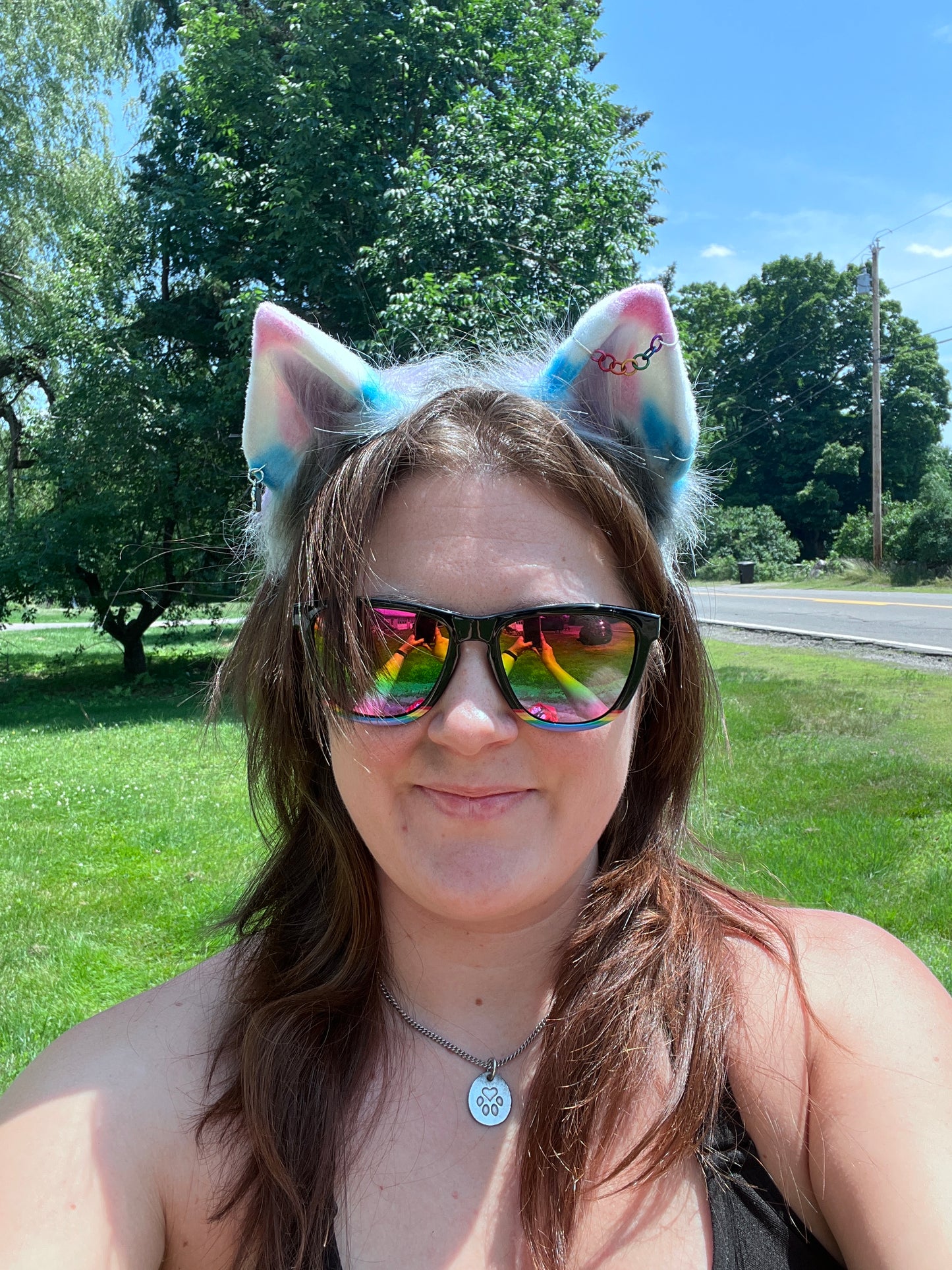 Person wearing colorful pet play ears