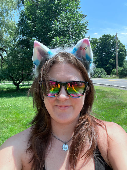 Person wearing colorful pet play ears