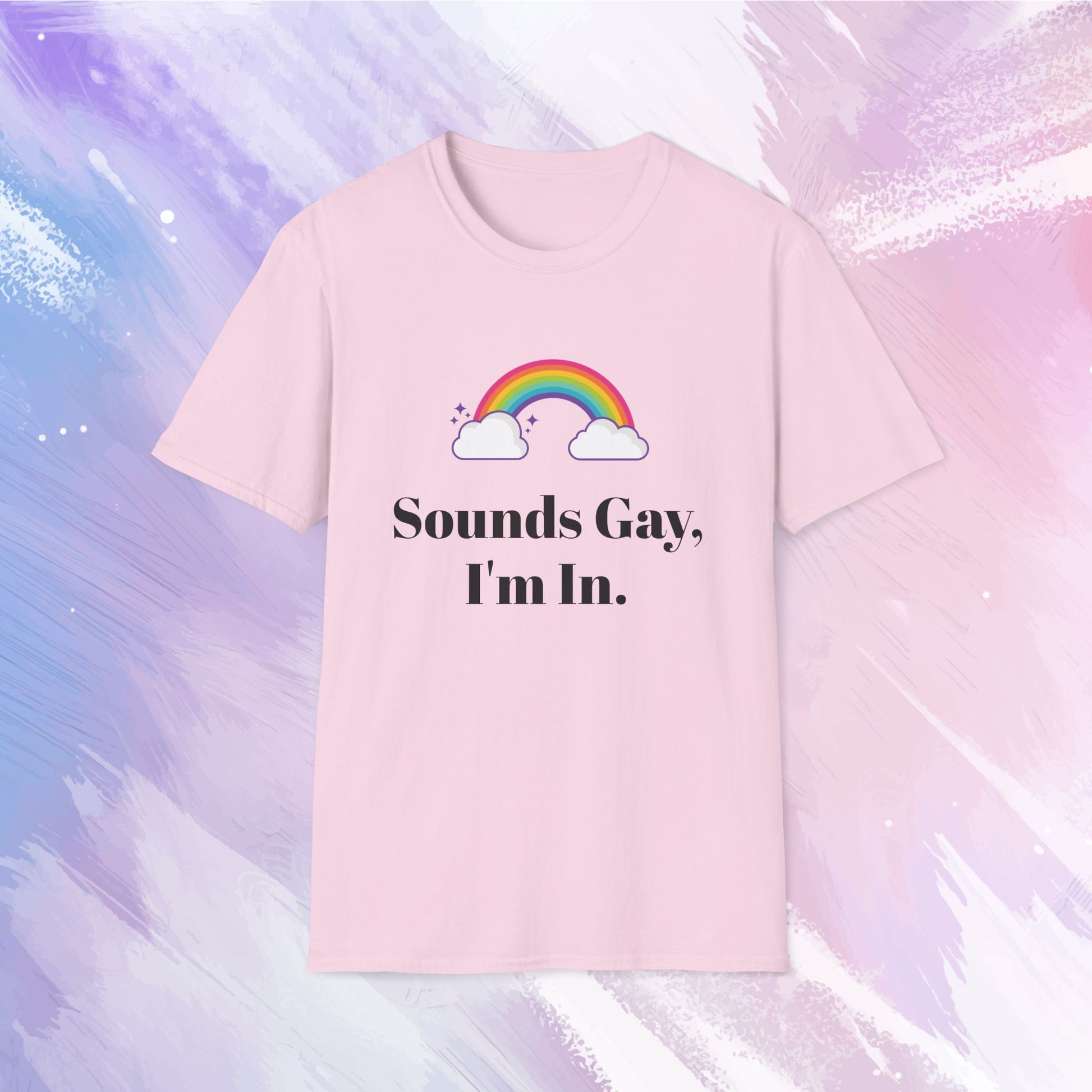 Shirt featuring a colorful rainbow with the text 'Sounds gay, I'm in' written in bold, playful font, celebrating LGBTQ+ pride and inclusivity.