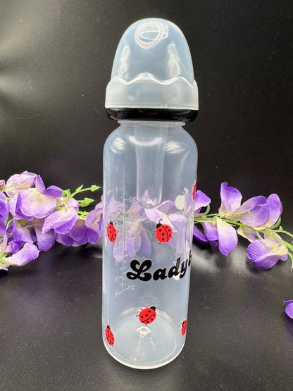 Clear adult baby bottle with ladybug design 