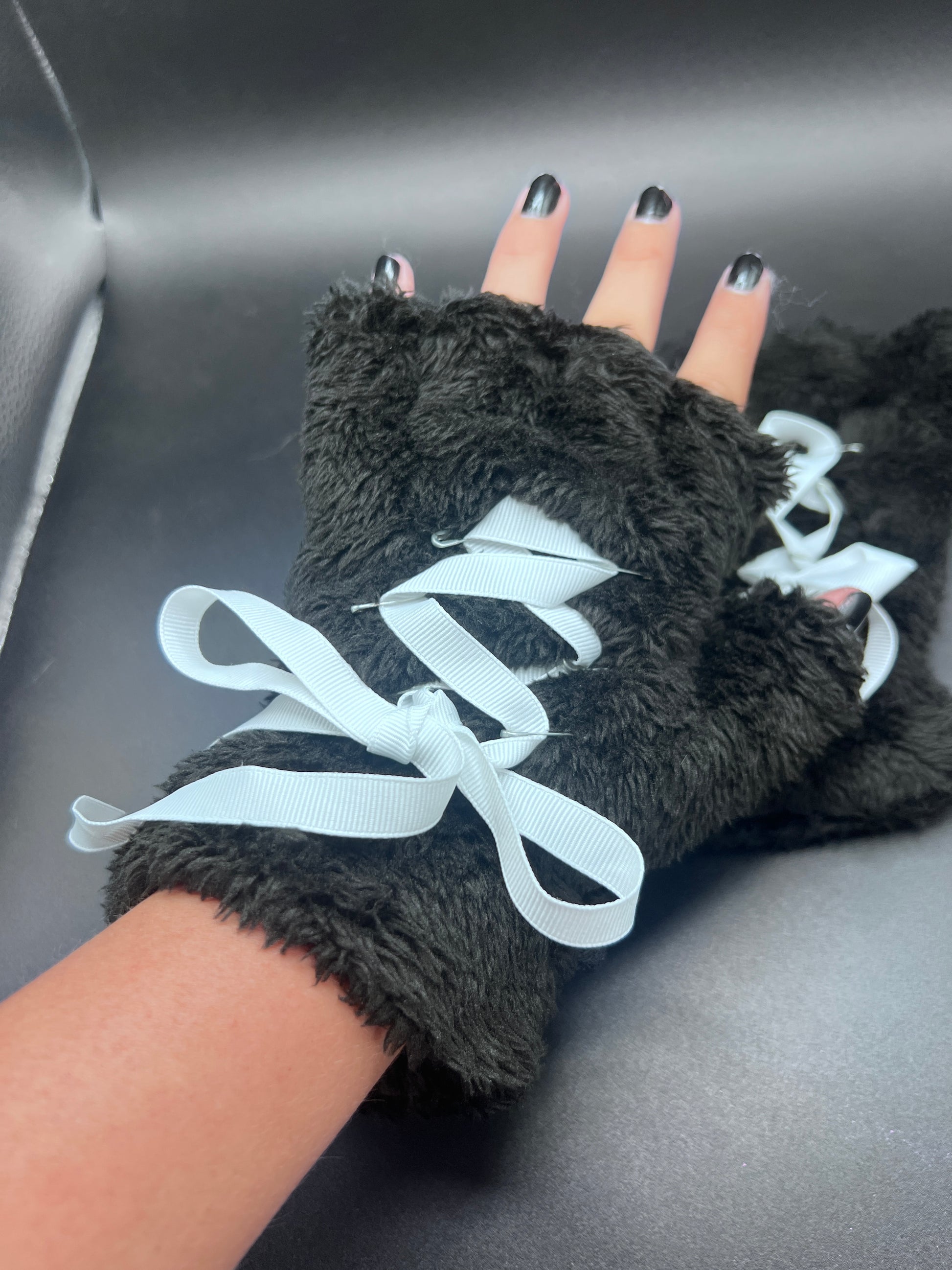 black corset paws being worn for example of fit