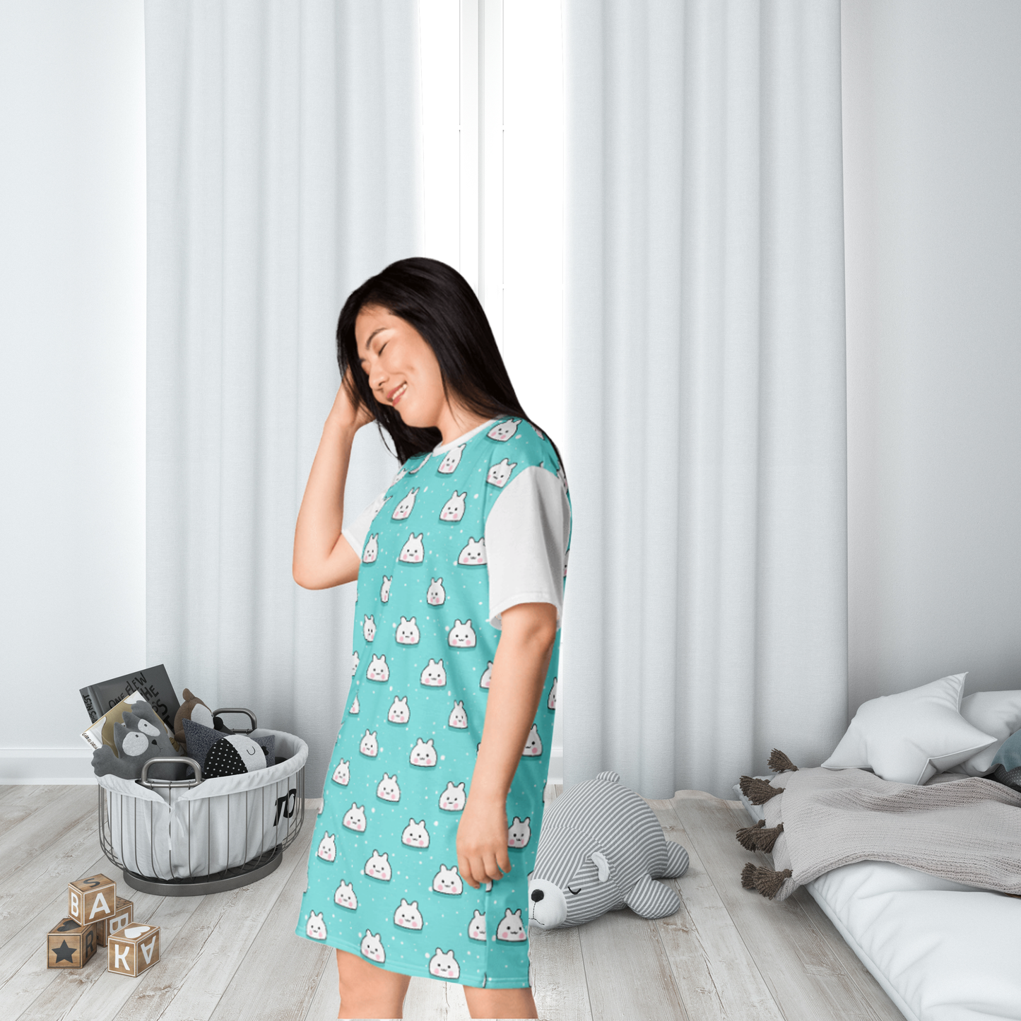 A teal adult nightgown featuring a cute design with white Kawaii bunny faces, creating a playful and cozy bedtime look.