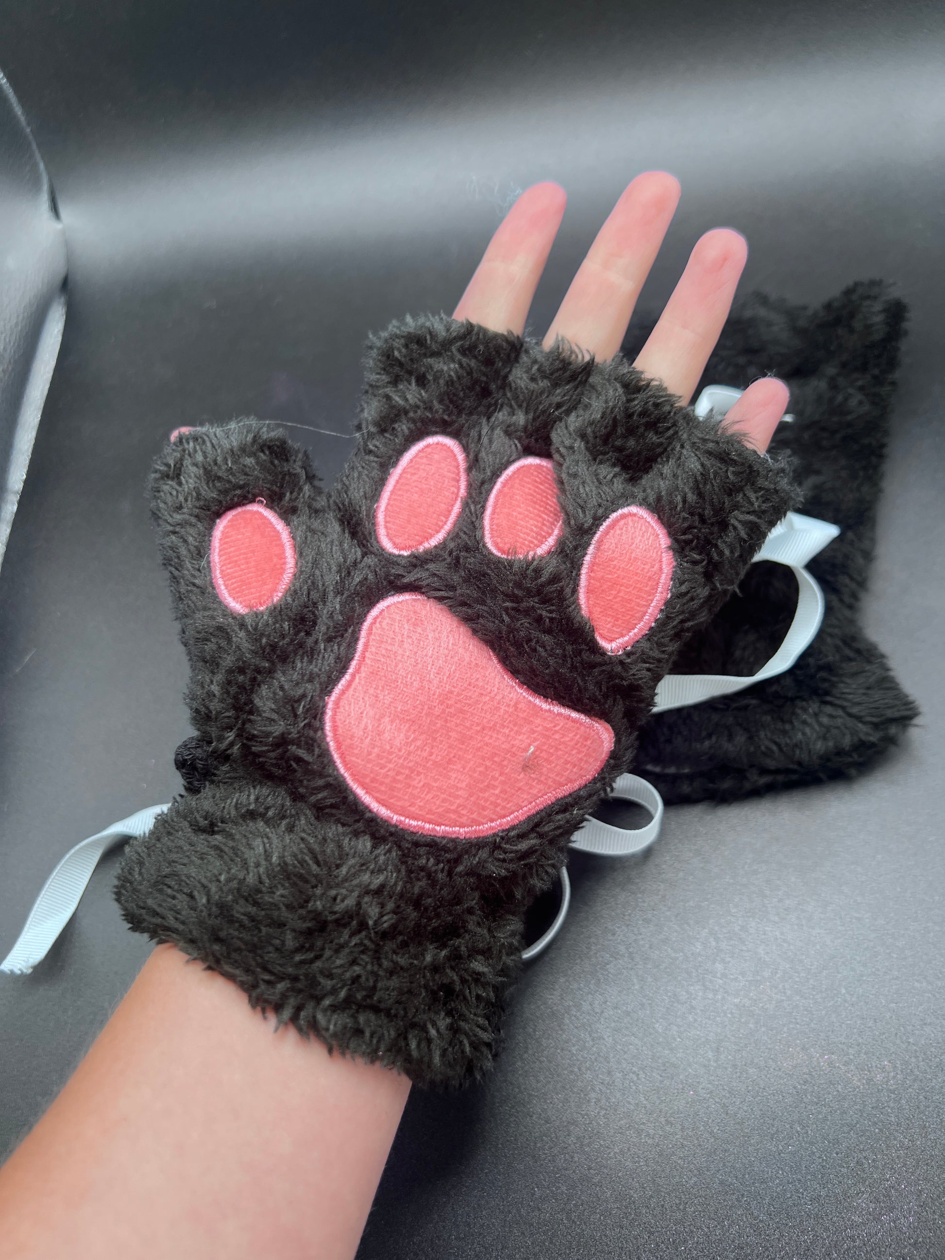 black fingerless paw gloves with pink paw pads