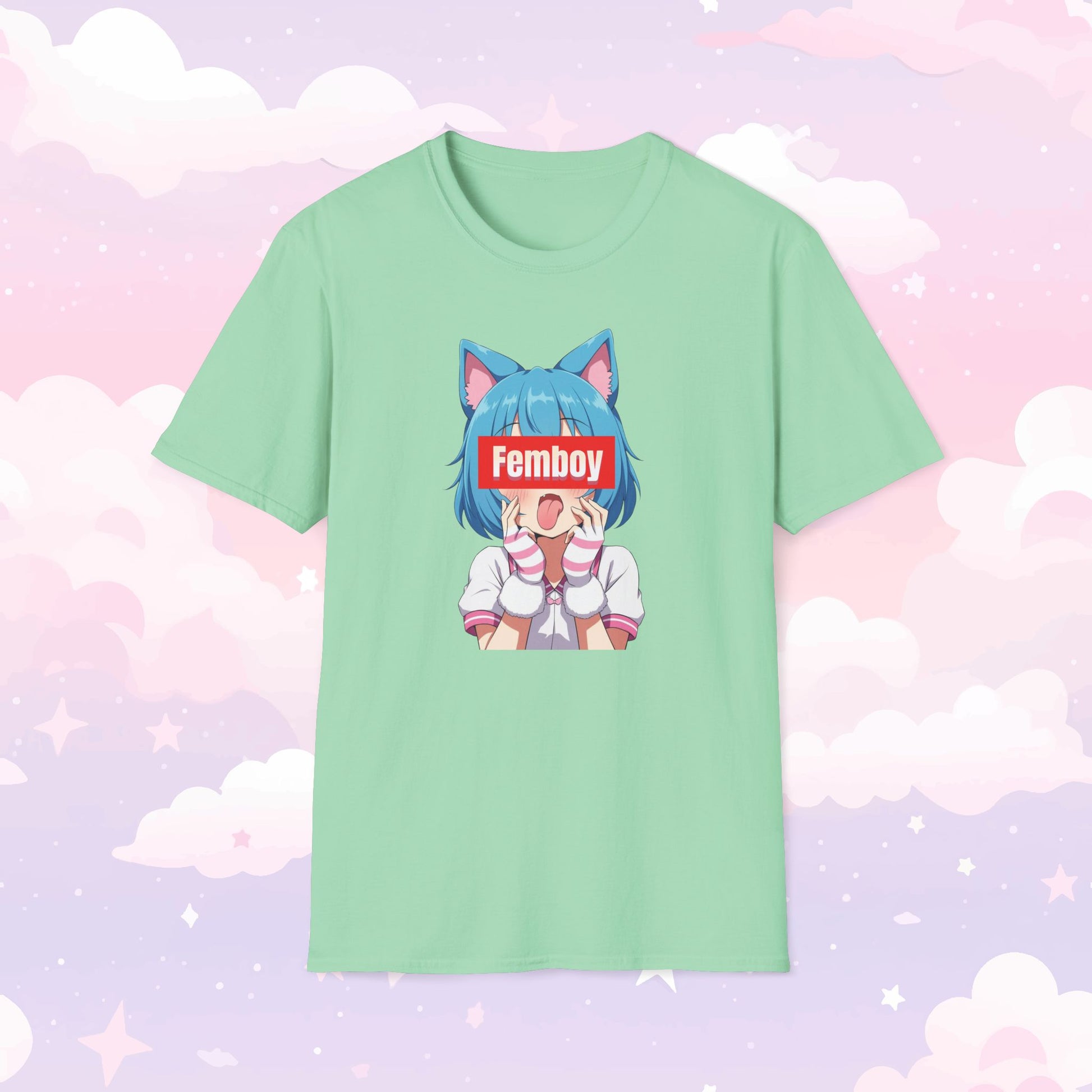 Shirt featuring a kawaii character with cat ears sticking their tongue out, with the word 'Femboy' written over their face in bold, stylish text.