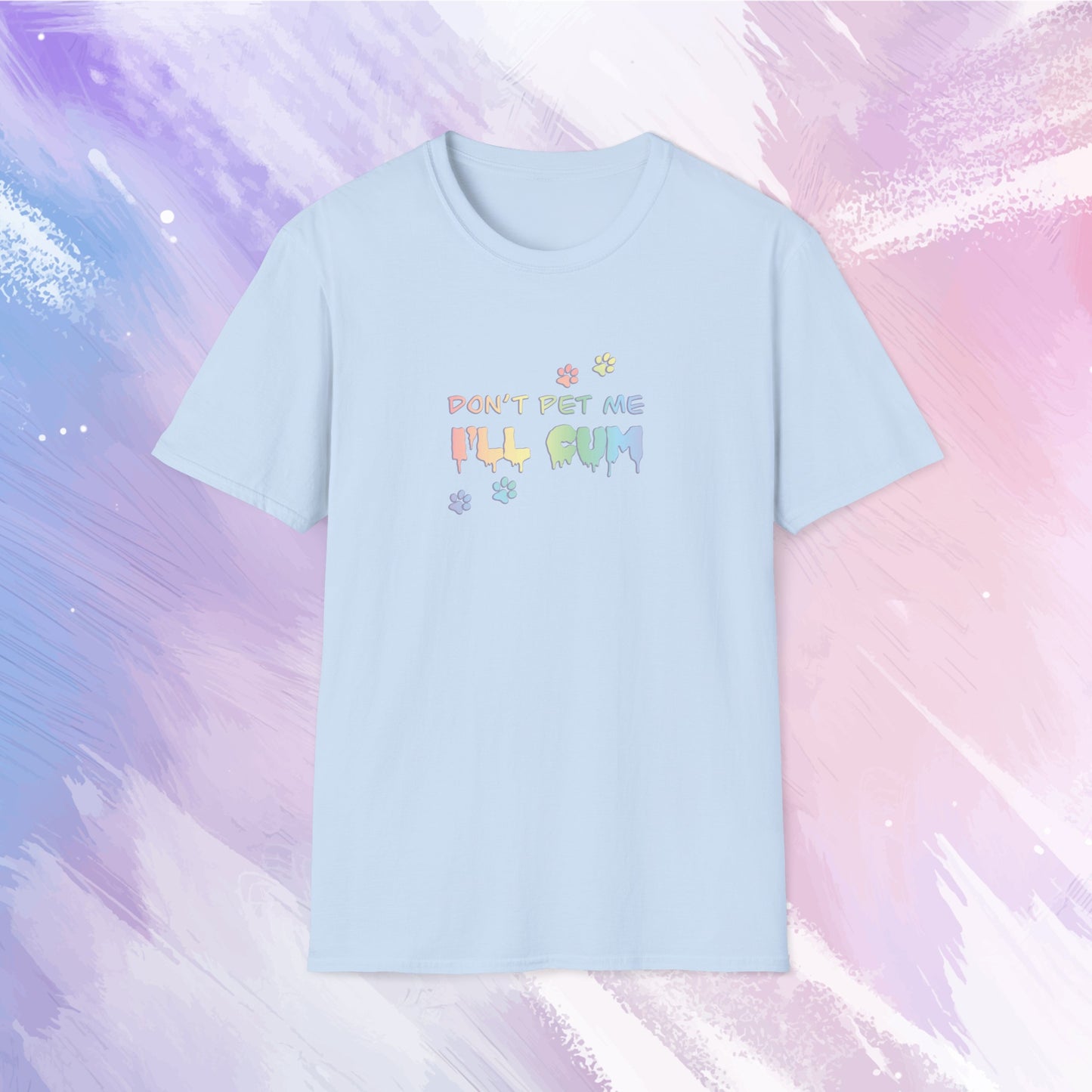 T-shirt featuring text saying "Don't pet me, I'll cum" in rainbow text with cute paw prints going across the text.