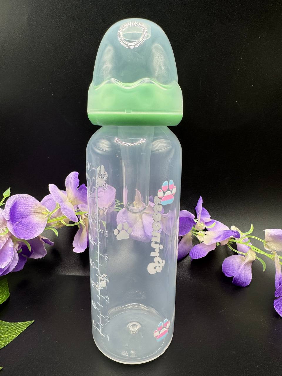 Age regression adult baby bottle with trans pride paw prints and text Princess