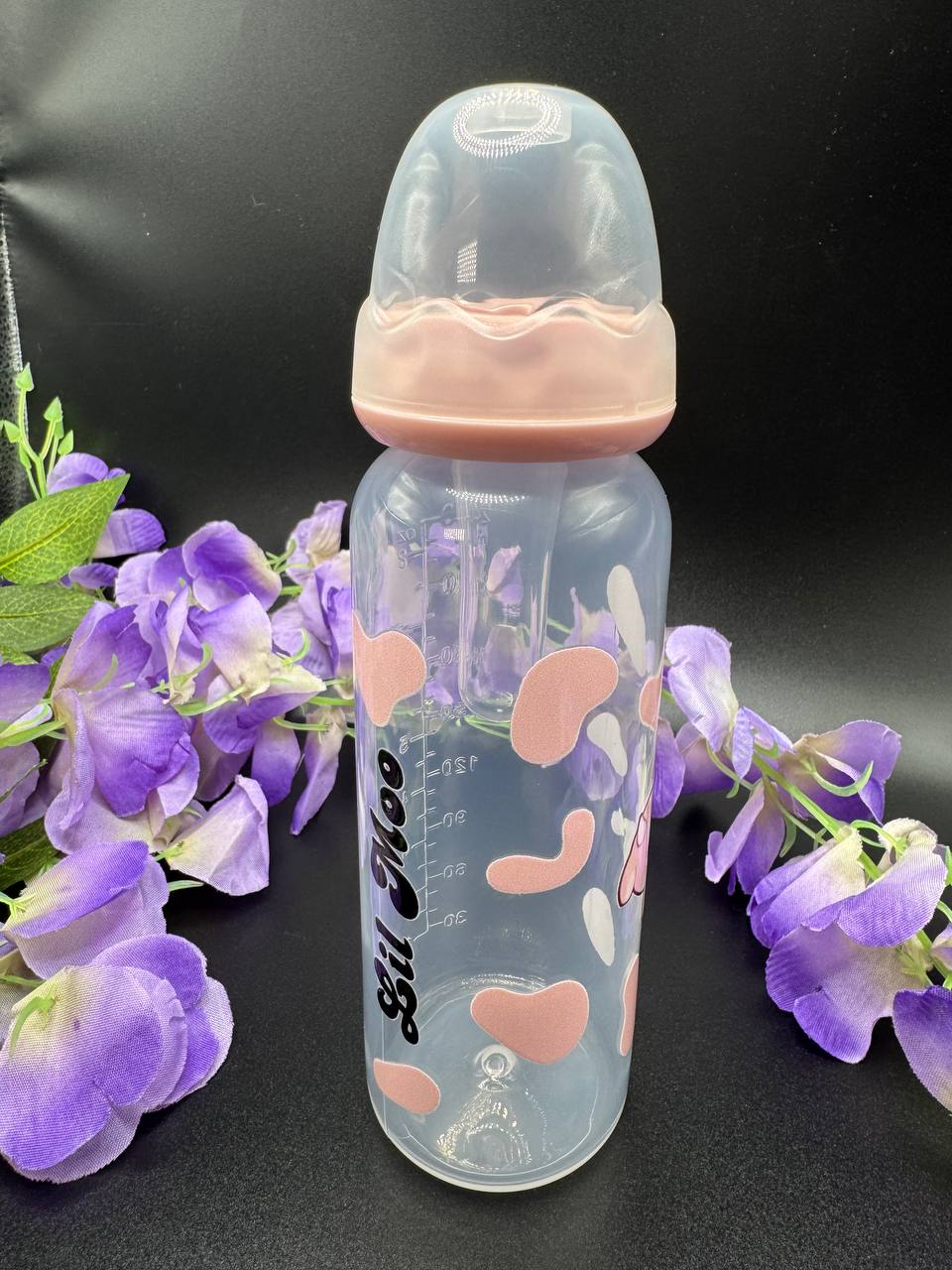 Lil Moo kawaii cow-themed adult baby bottle shown with secure cap and 8oz size