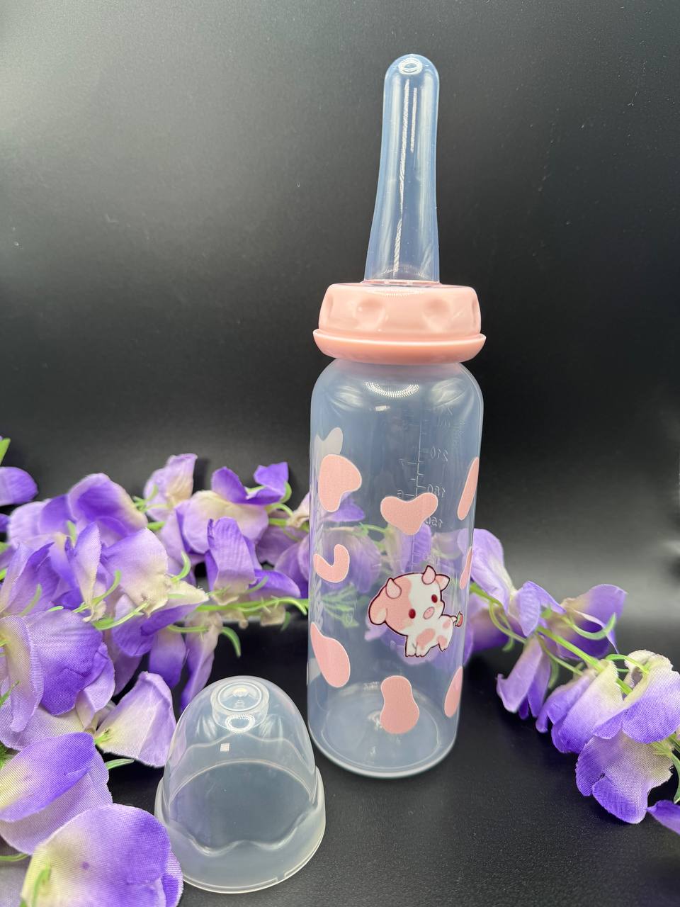Handmade ABDL adult bottle with pink cow artwork and latex-free adult nipple