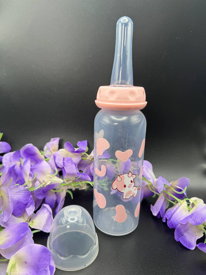 Handmade ABDL adult bottle with pink cow artwork and latex-free adult nipple