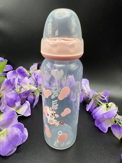 ABDL adult baby bottle with pink and white cow illustration and BPA-free design