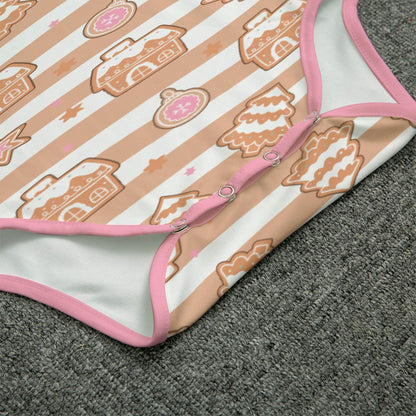 Adult baby gingerbread man pattern body suit with snaps and pink trim
