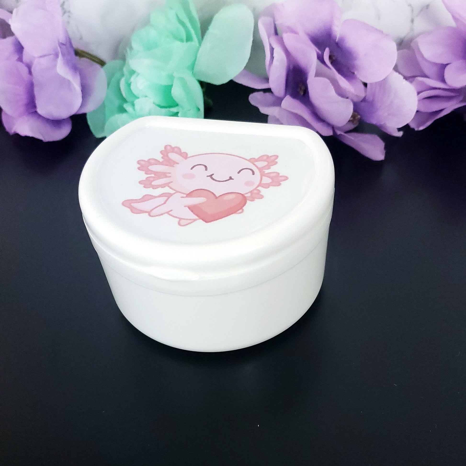 white adult pacifier case with kawaii pink axolotl holding a heart