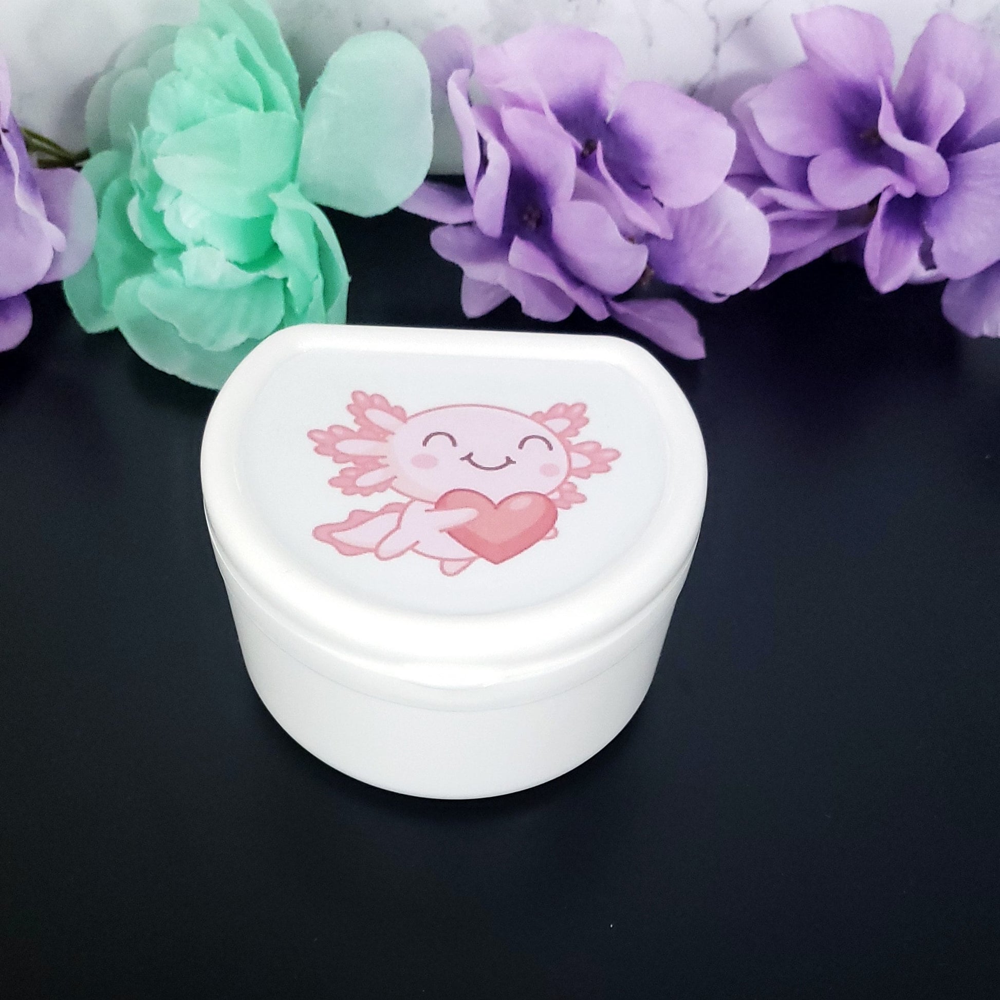 white adult pacifier case with kawaii pink axolotl holding a heart