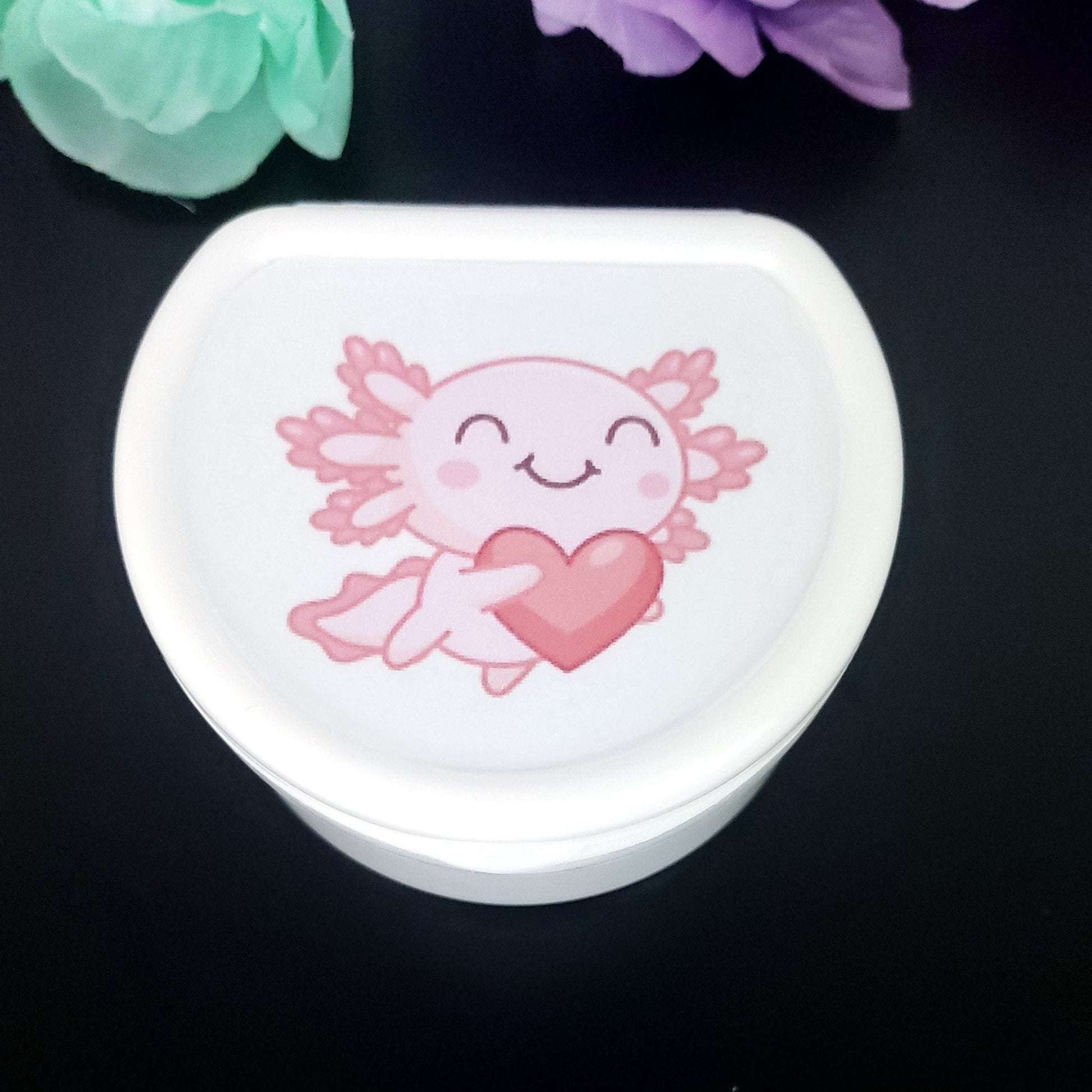 white adult pacifier case with kawaii pink axolotl holding a heart