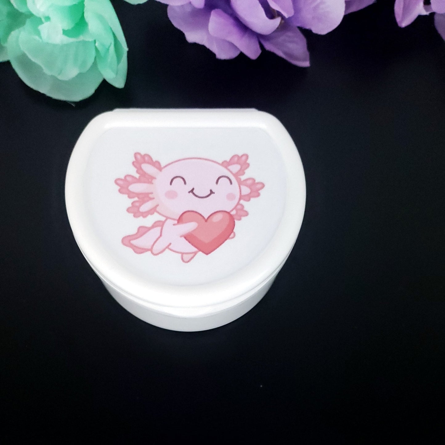 white adult pacifier case with kawaii pink axolotl holding a heart